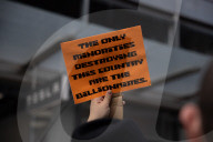 Activists Gather At NYC AIDS Memorial And March To Tesla Dealership For ‚ÄúTesla Takedown‚Äù Rally To Protest DOGE Cuts