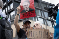 Activists Gather At NYC AIDS Memorial And March To Tesla Dealership For ‚ÄúTesla Takedown‚Äù Rally To Protest DOGE Cuts