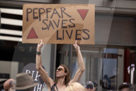 Activists Gather At NYC AIDS Memorial And March To Tesla Dealership For ‚ÄúTesla Takedown‚Äù Rally To Protest DOGE Cuts