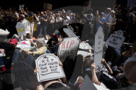 Activists Gather At NYC AIDS Memorial And March To Tesla Dealership For ‚ÄúTesla Takedown‚Äù Rally To Protest DOGE Cuts