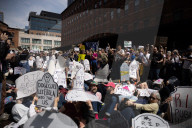 Activists Gather At NYC AIDS Memorial And March To Tesla Dealership For ‚ÄúTesla Takedown‚Äù Rally To Protest DOGE Cuts