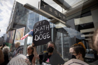 Activists Gather At NYC AIDS Memorial And March To Tesla Dealership For ‚ÄúTesla Takedown‚Äù Rally To Protest DOGE Cuts