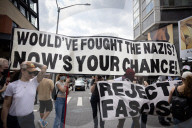 Activists Gather At NYC AIDS Memorial And March To Tesla Dealership For ‚ÄúTesla Takedown‚Äù Rally To Protest DOGE Cuts
