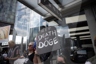 Activists Gather At NYC AIDS Memorial And March To Tesla Dealership For ‚ÄúTesla Takedown‚Äù Rally To Protest DOGE Cuts