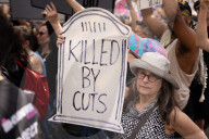 Activists Gather At NYC AIDS Memorial And March To Tesla Dealership For ‚ÄúTesla Takedown‚Äù Rally To Protest DOGE Cuts