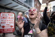Activists Gather At NYC AIDS Memorial And March To Tesla Dealership For ‚ÄúTesla Takedown‚Äù Rally To Protest DOGE Cuts