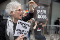 Activists Gather At NYC AIDS Memorial And March To Tesla Dealership For ‚ÄúTesla Takedown‚Äù Rally To Protest DOGE Cuts