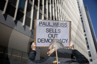 Protesters Demonstrate Outside Of Paul, Weiss Law Firm In NYC