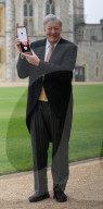 Sir Stephen Fry knighted