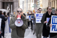 Demonstrators Protest Mass Firings Of Federal Employees By DOGE