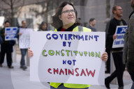 Demonstrators Protest Mass Firings Of Federal Employees By DOGE