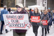 Demonstrators Protest Mass Firings Of Federal Employees By DOGE
