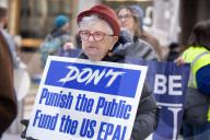 Demonstrators Protest Mass Firings Of Federal Employees By DOGE