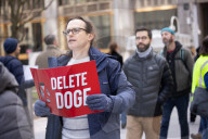 Demonstrators Protest Mass Firings Of Federal Employees By DOGE