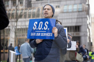 Demonstrators Protest Mass Firings Of Federal Employees By DOGE
