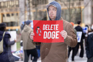 Demonstrators Protest Mass Firings Of Federal Employees By DOGE