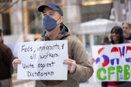 Demonstrators Protest Mass Firings Of Federal Employees By DOGE