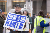 Demonstrators Protest Mass Firings Of Federal Employees By DOGE