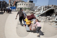 Palestinians Flee The Shuja'iyya Neighborhood 