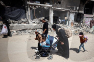 Palestinians Flee The Shuja'iyya Neighborhood 