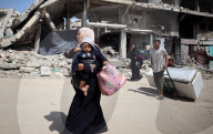 Palestinians Flee The Shuja'iyya Neighborhood 