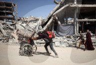 Palestinians Flee The Shuja'iyya Neighborhood 