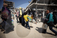 Palestinians Flee The Shuja'iyya Neighborhood 