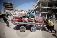 Palestinians Flee The Shuja'iyya Neighborhood 
