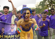 Jubillant Kolkata Knight Riders Supporters During IPL Match .