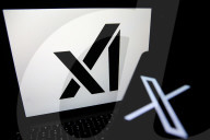 Logos Of Large Companies On Laptop