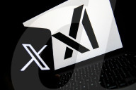 Logos Of Large Companies On Laptop