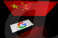 Logos Of Large Companies On Laptop