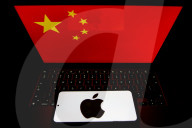 Logos Of Large Companies On Laptop