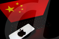 Logos Of Large Companies On Laptop