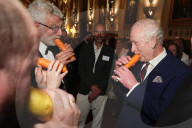 King Charles with the London Vegetable Orchestra in Windsor Castle, Windsor, UK.