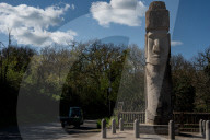 A Lonesome Moai Stands In A Small Italian Town Some 9,000 Miles Away From Its Easter Island Brethren.