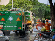 Sanitation Workers Sweep Streets In Ho Chi Minh City