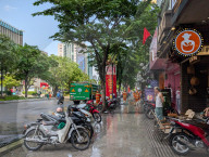 Sanitation Workers Sweep Streets In Ho Chi Minh City