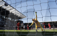 Premier League match between Fulham and Liverpool at Craven Cottage in London, UK.