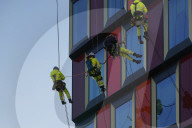 Technicians On High-Rise In Stockholm