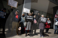 Protesters Demonstrate Outside Of Law Firm Paul Weiss In NYC