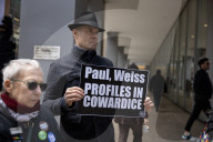 Protesters Demonstrate Outside Of Law Firm Paul Weiss In NYC