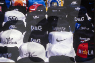 Logomania On Display: Branded Baseball Caps At A Street Market