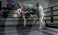 Robot boxers slug it out in the ring