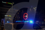 Police Vehicle Blocks Traffic During Nighttime Operation