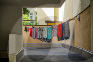 Laundry Hanging In Residential Courtyard