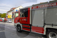 German Fire Truck On A City Street On An Emergency Run