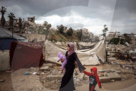 Palestinians Flee Again After Israel's Attacks On Gaza 