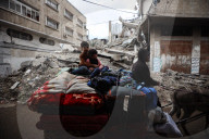 Palestinians Flee Again After Israel's Attacks On Gaza 