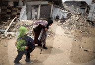 Palestinians Flee Again After Israel's Attacks On Gaza 